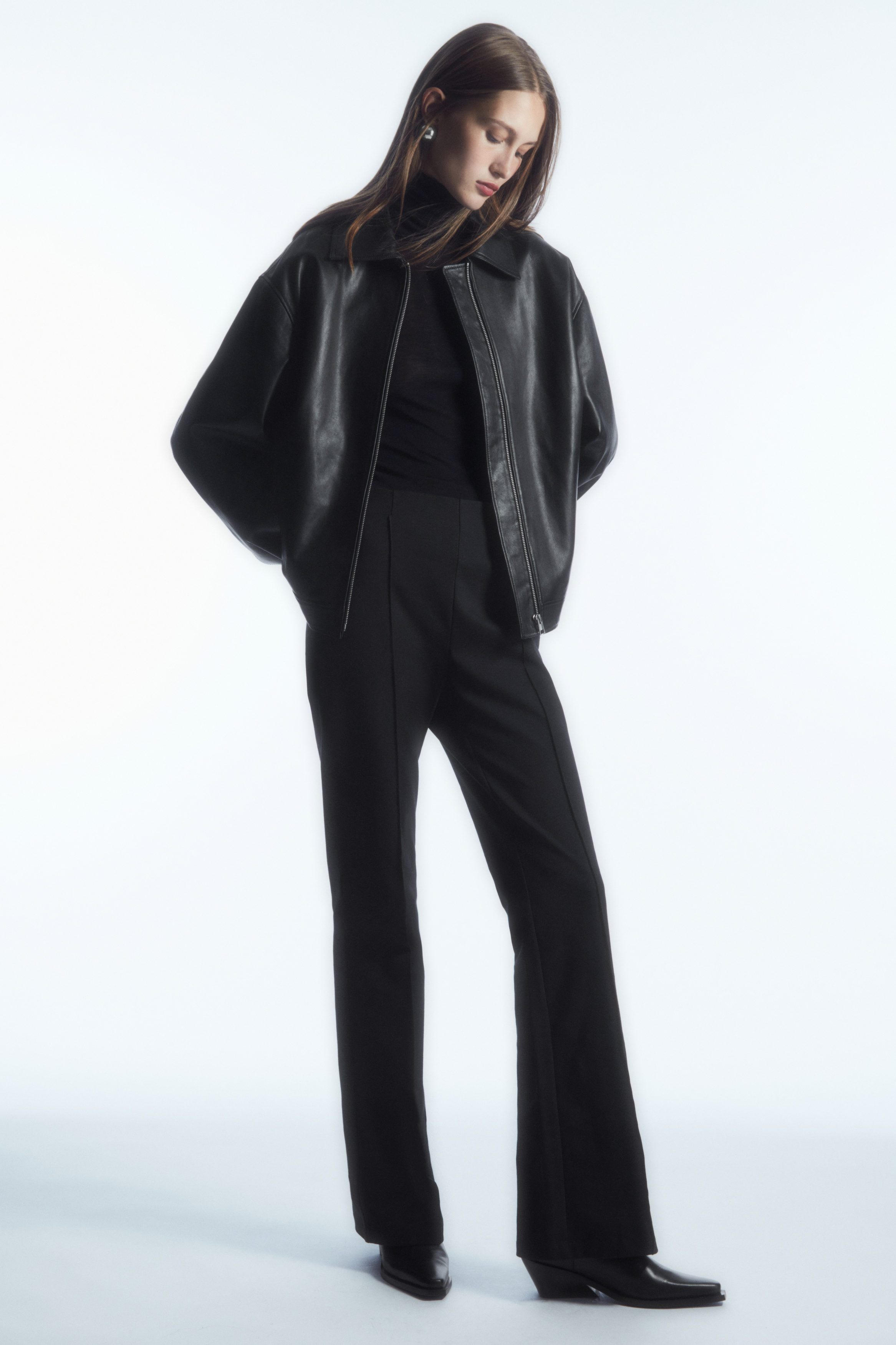 Shop PINTUCKED KICK-FLARE TROUSERS online